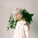 photography-of-a-woman-holding-green-leaves-1071162-scaled.jpg